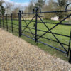 pair of bowtop gates with line wires for dogs or livestock
