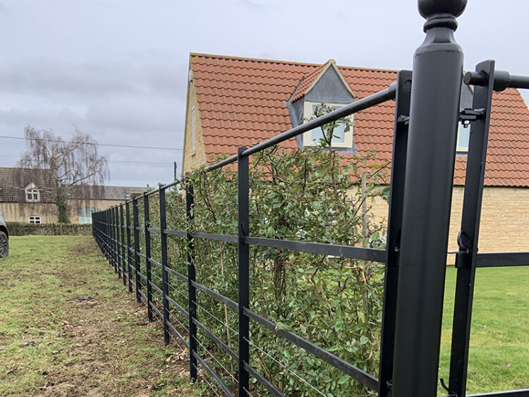 Fencing fitted with 3 straining wires for smaller livestock and dogs