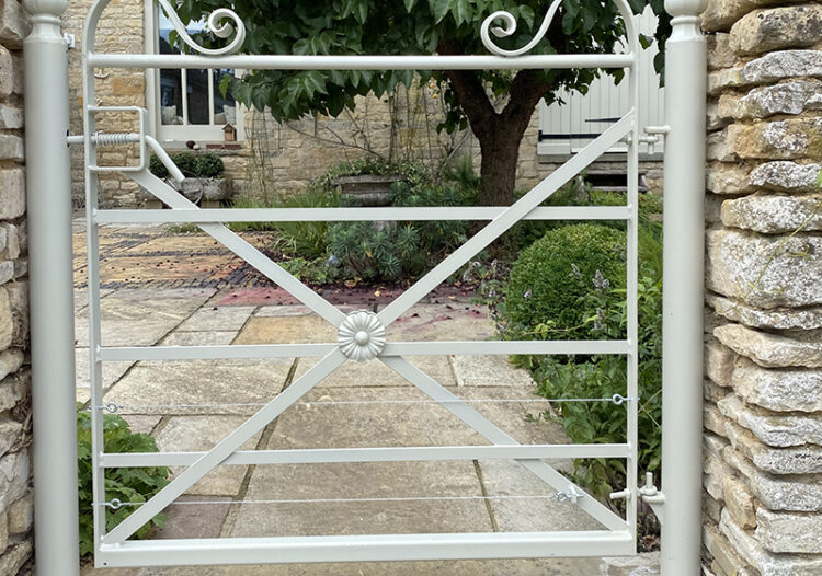 5 bar scroll top pedestrian gate with X-bracing and rosette detailing