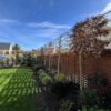 Woven steel fencing with planting