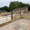 stepped estate fencing on wall
