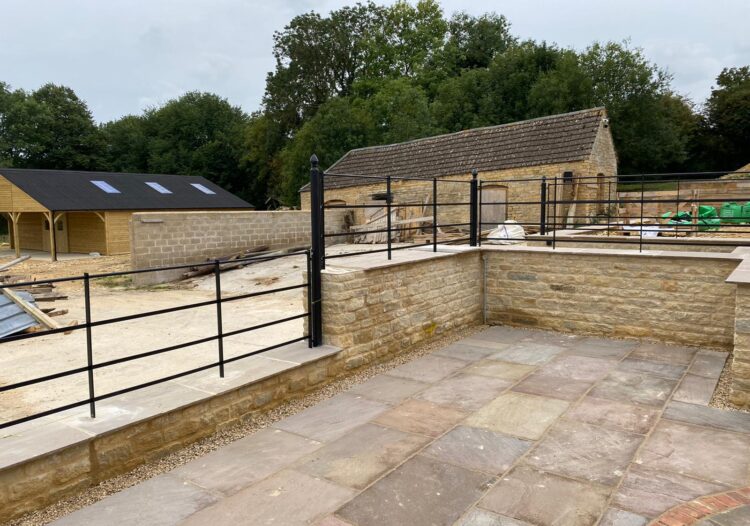 stepped estate fencing on wall