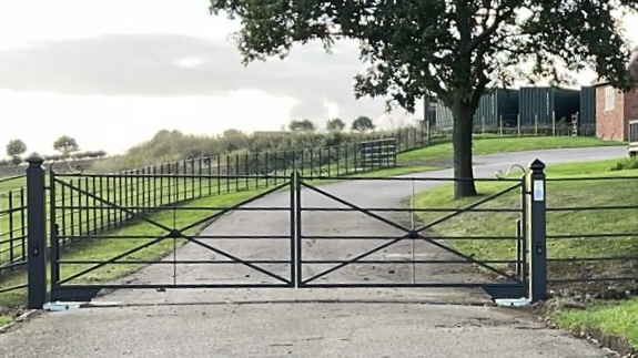 4m pair of scroll top estate gates that have been automated